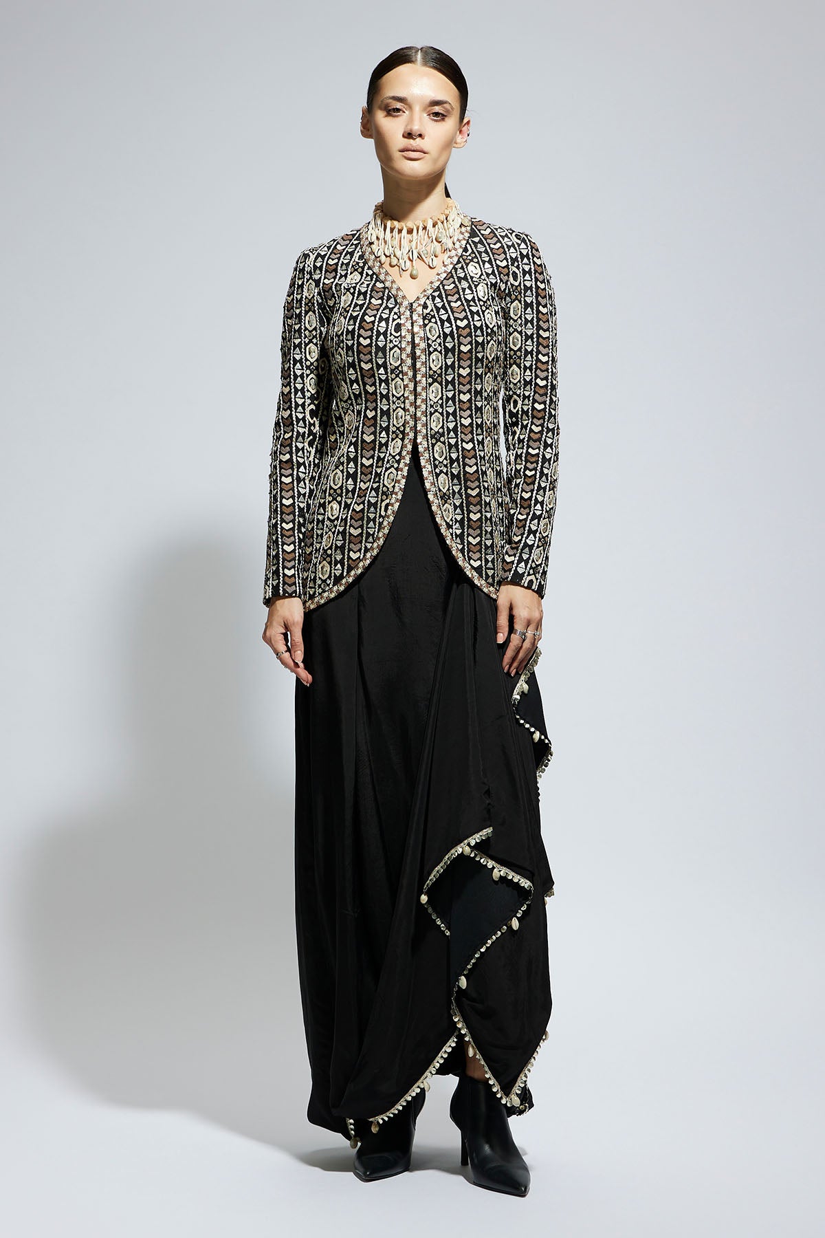 Black Embellished Jacket Paired with Drape Skirt