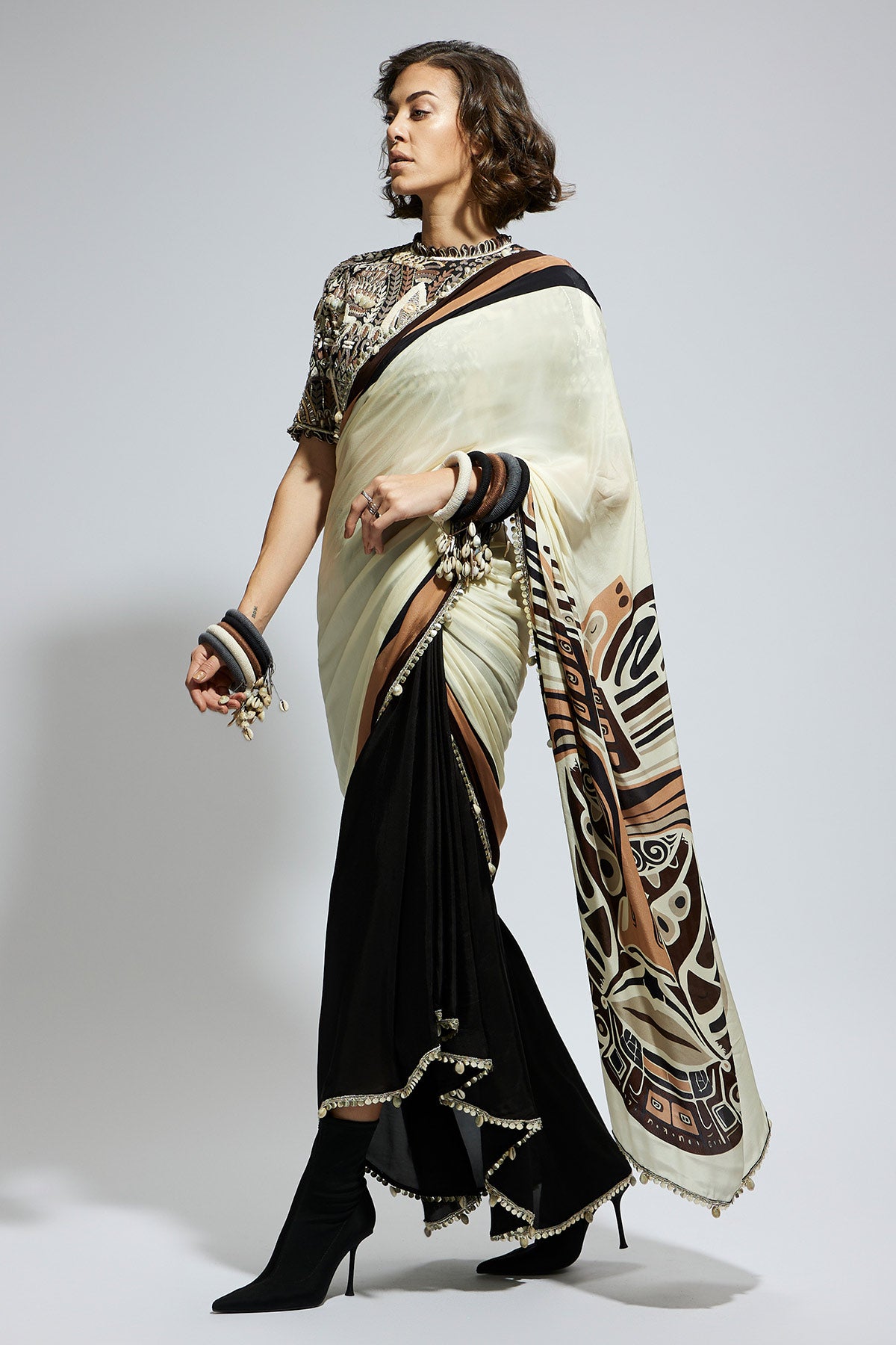 Color Block Mask Print Cascade Sari Paired with Black Abstract Embellished Blouse