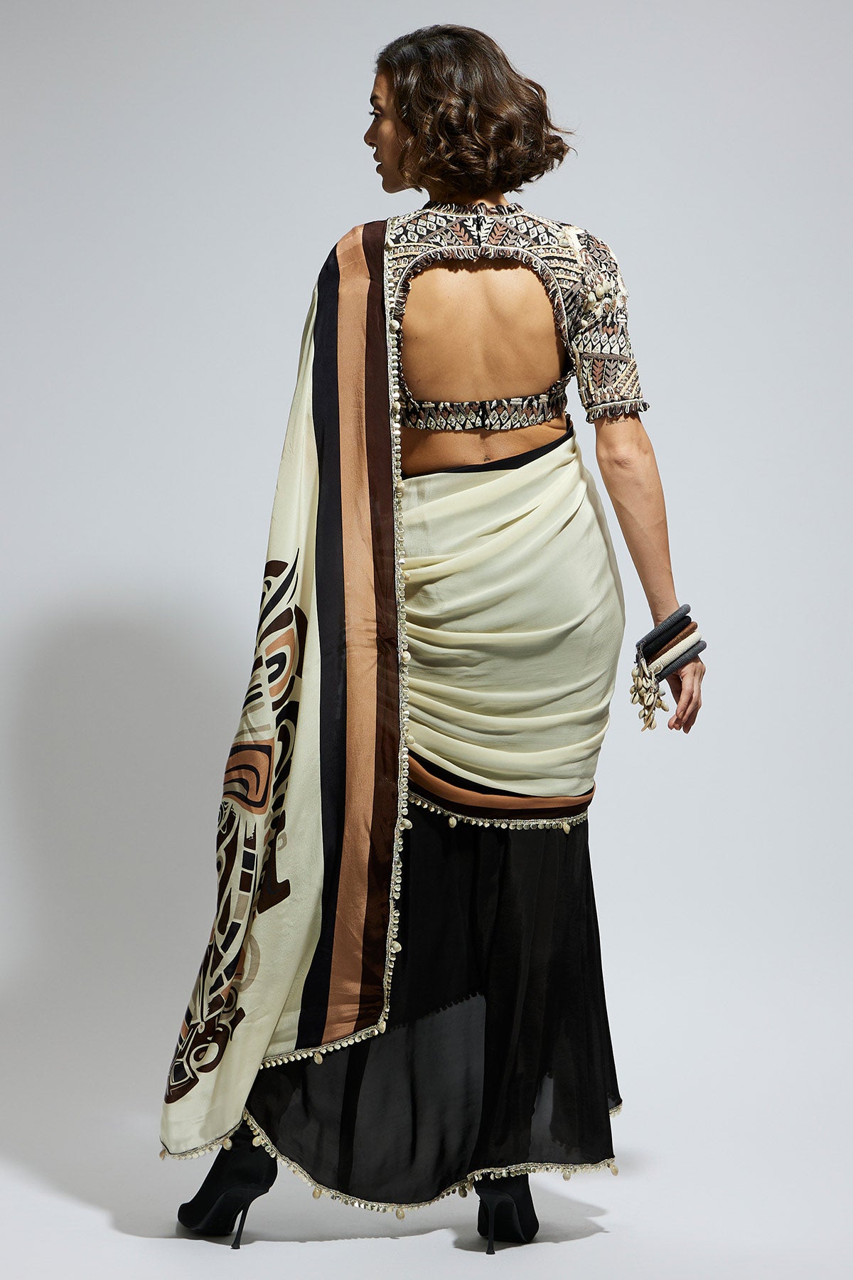 Color Block Mask Print Cascade Sari Paired with Black Abstract Embellished Blouse