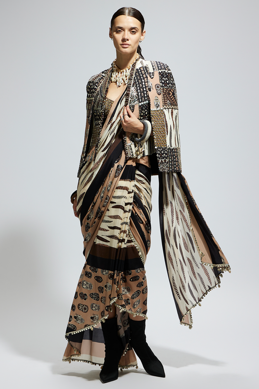 Mask and Feather Print Cascade Saree Paired with Metallic Scallop Bustier with Patchwork Cape Jacket
