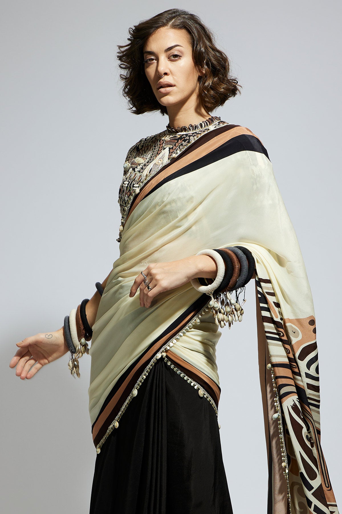 Color Block Mask Print Cascade Sari Paired with Black Abstract Embellished Blouse