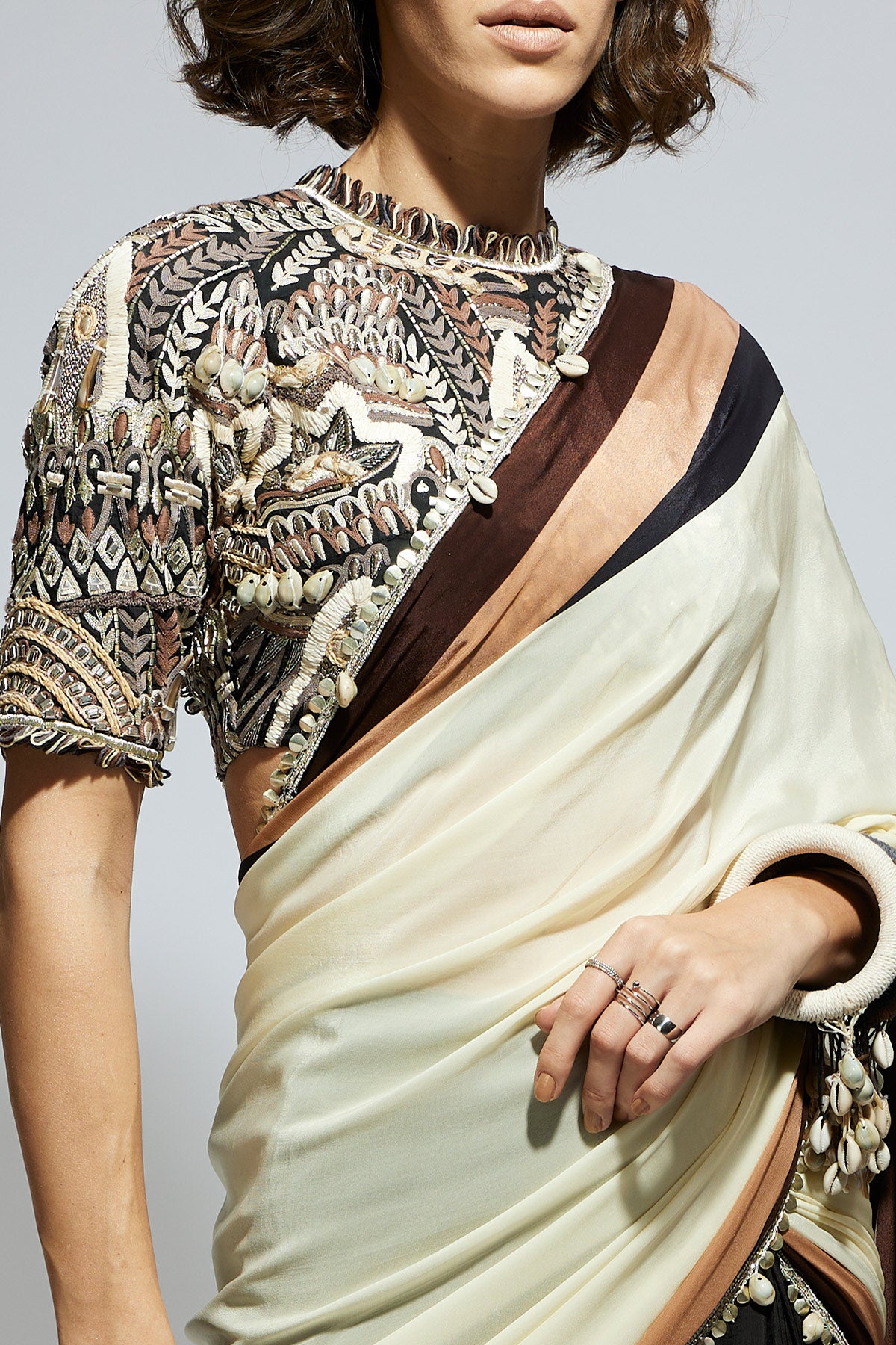Color Block Mask Print Cascade Sari Paired with Black Abstract Embellished Blouse