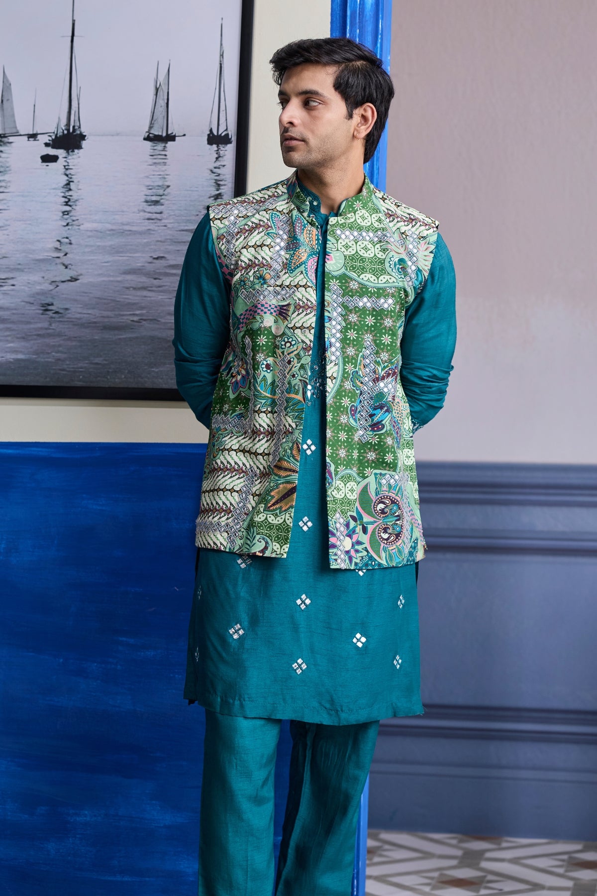 TEAL GREEN EMBROIDERED KURTA WITH PRINT HIGHLIGHTED BUNDI JACKET PAIRED WITH SOLID PANTS