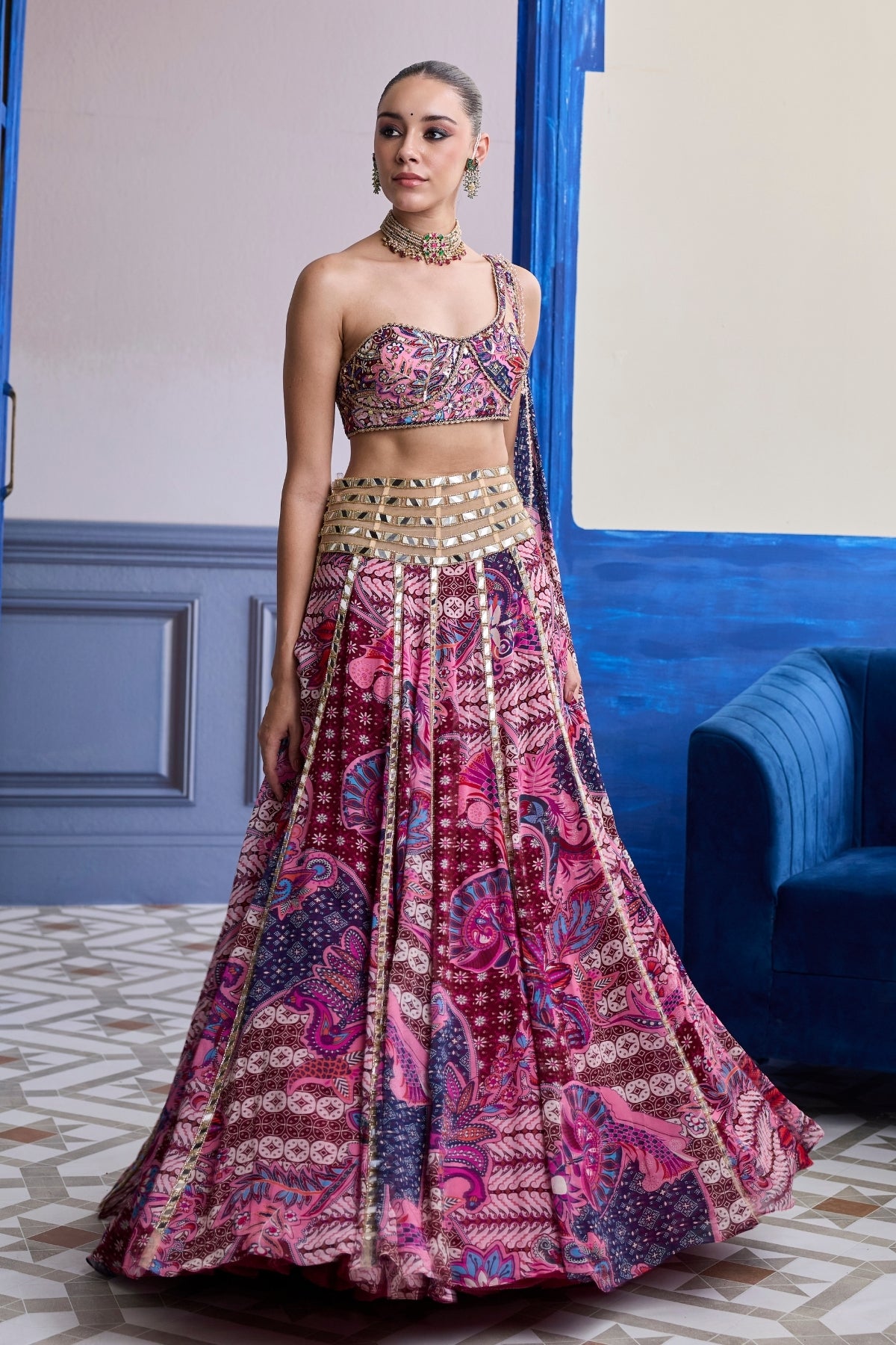 FUCHSIA FLORAL ONE-SHOULDER DRAPE BLOUSE WITH MIRROR LEHENGA SET