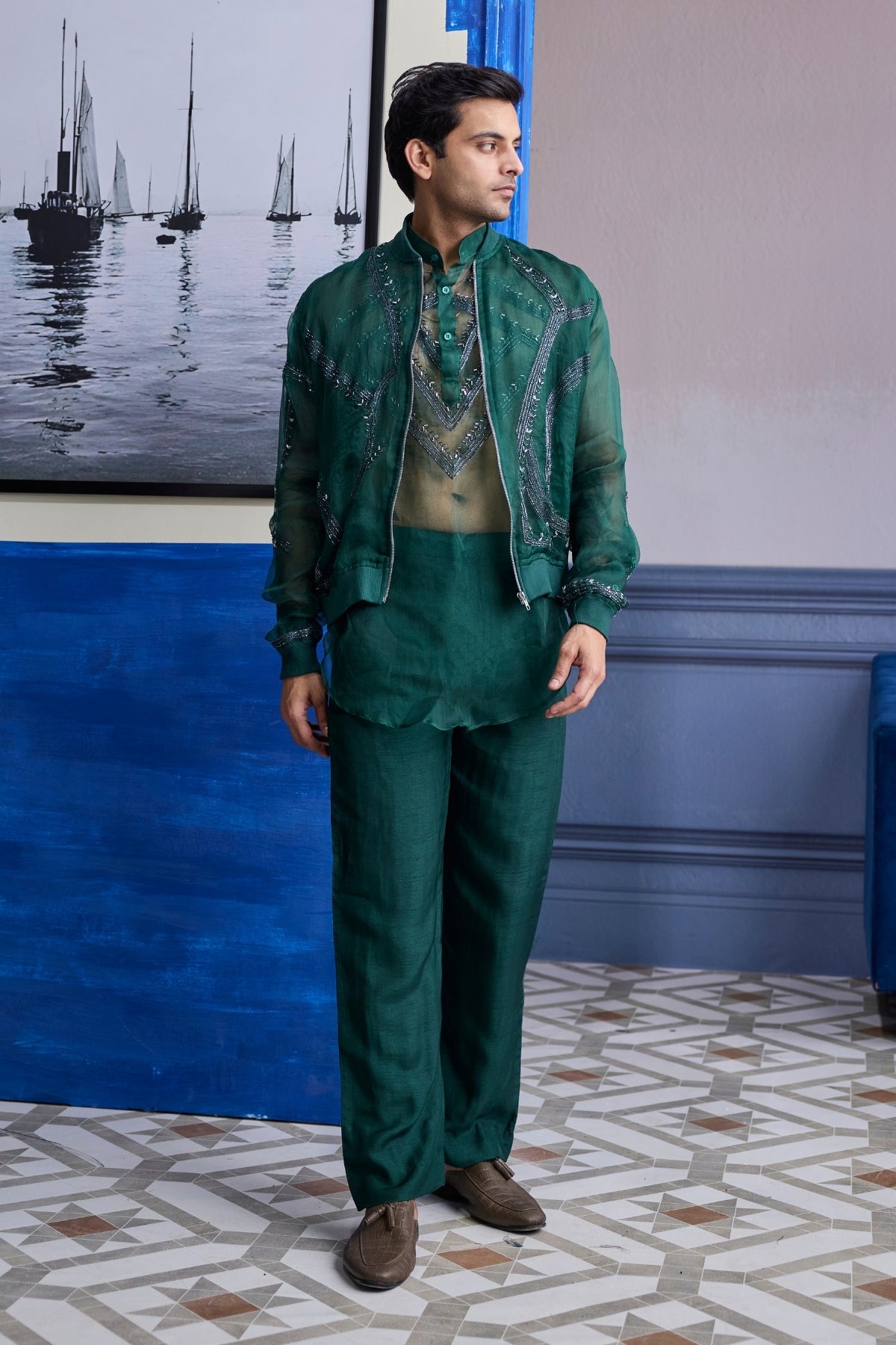 DARK GREEN ORGANZA KURTA WITH EMBROIDERED ORGANZA BOMBER JACKET PAIRED WITH SOLID PANTS