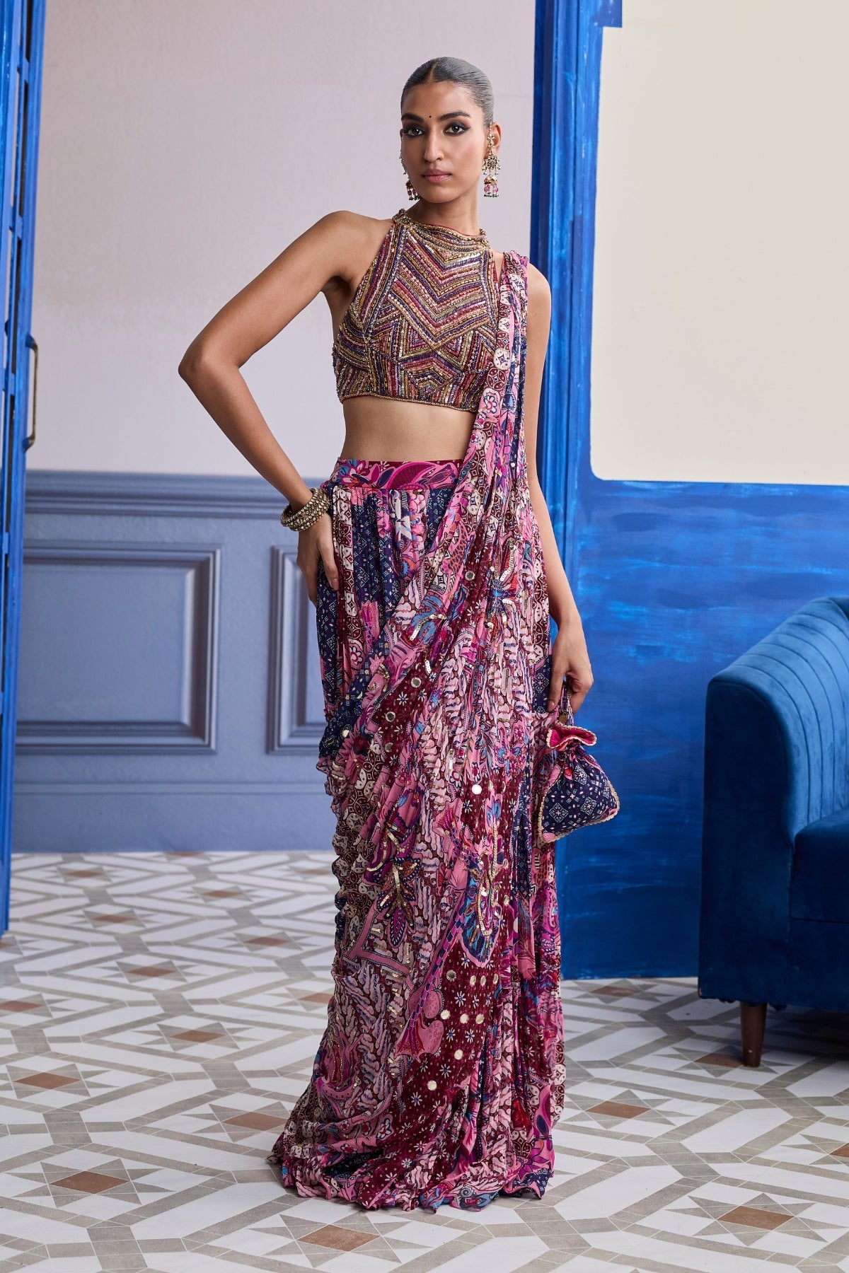 FUCHSIA EMBROIDERED BLOUSE WITH FLORAL DRAPE TIERED SAREE SET