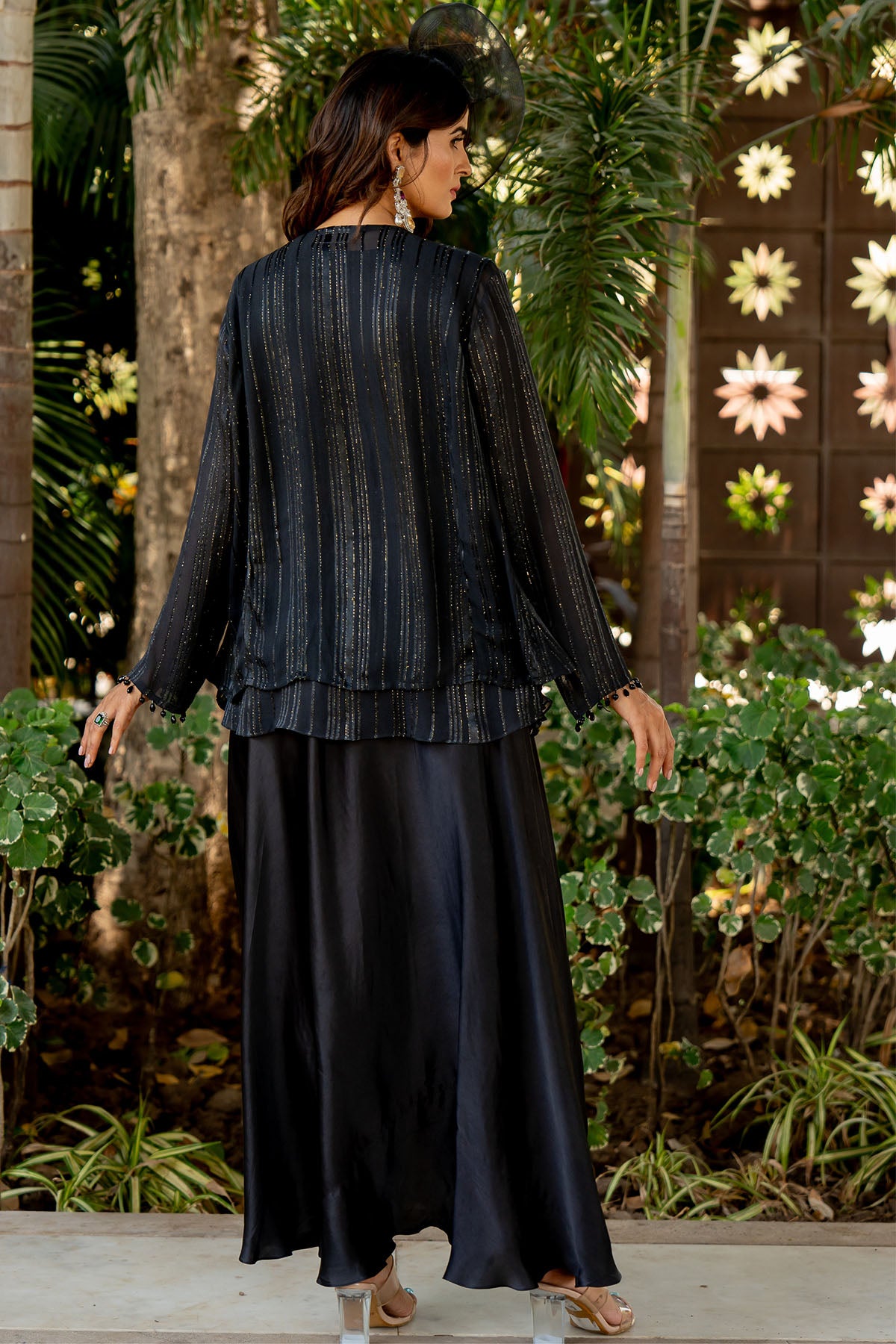 skirt is worn with a flared top