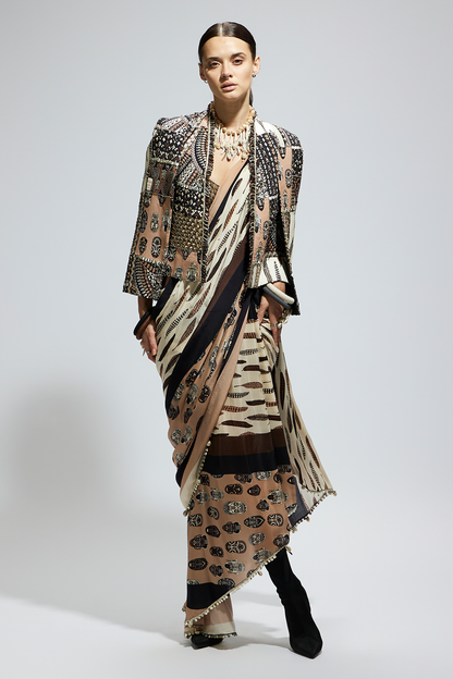 Mask and Feather Print Cascade Saree Paired with Metallic Scallop Bustier with Patchwork Cape Jacket
