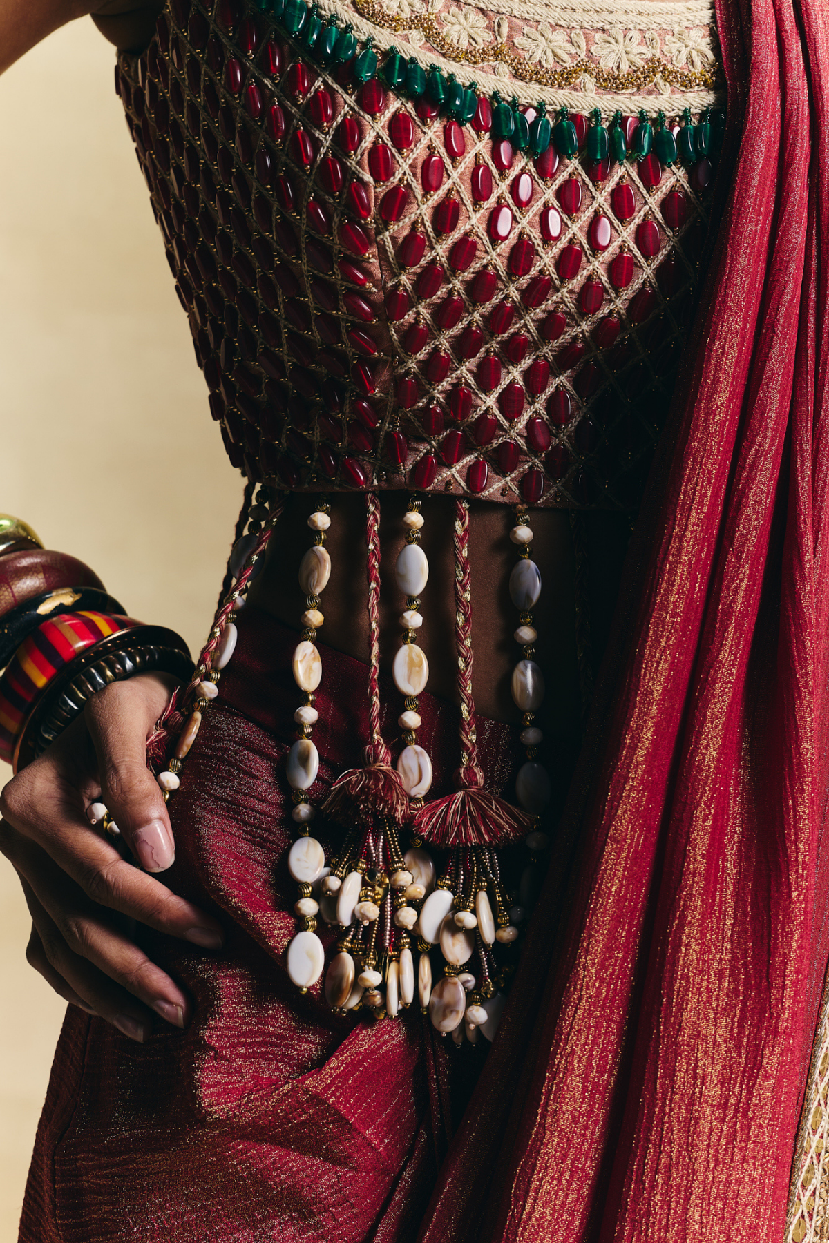 Red lovely blouse with stitched saree