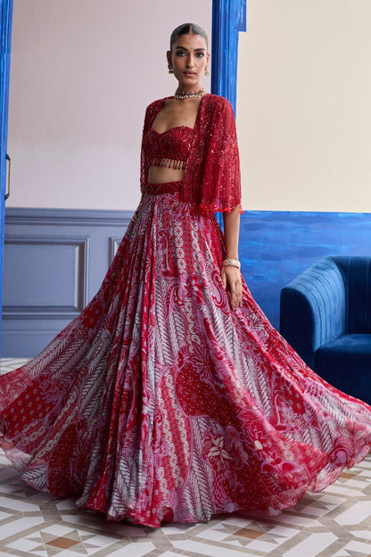 RED EMBROIDERED BLOUSE WITH TASSEL CAPE JACKET & FLORAL LEHENGA SET