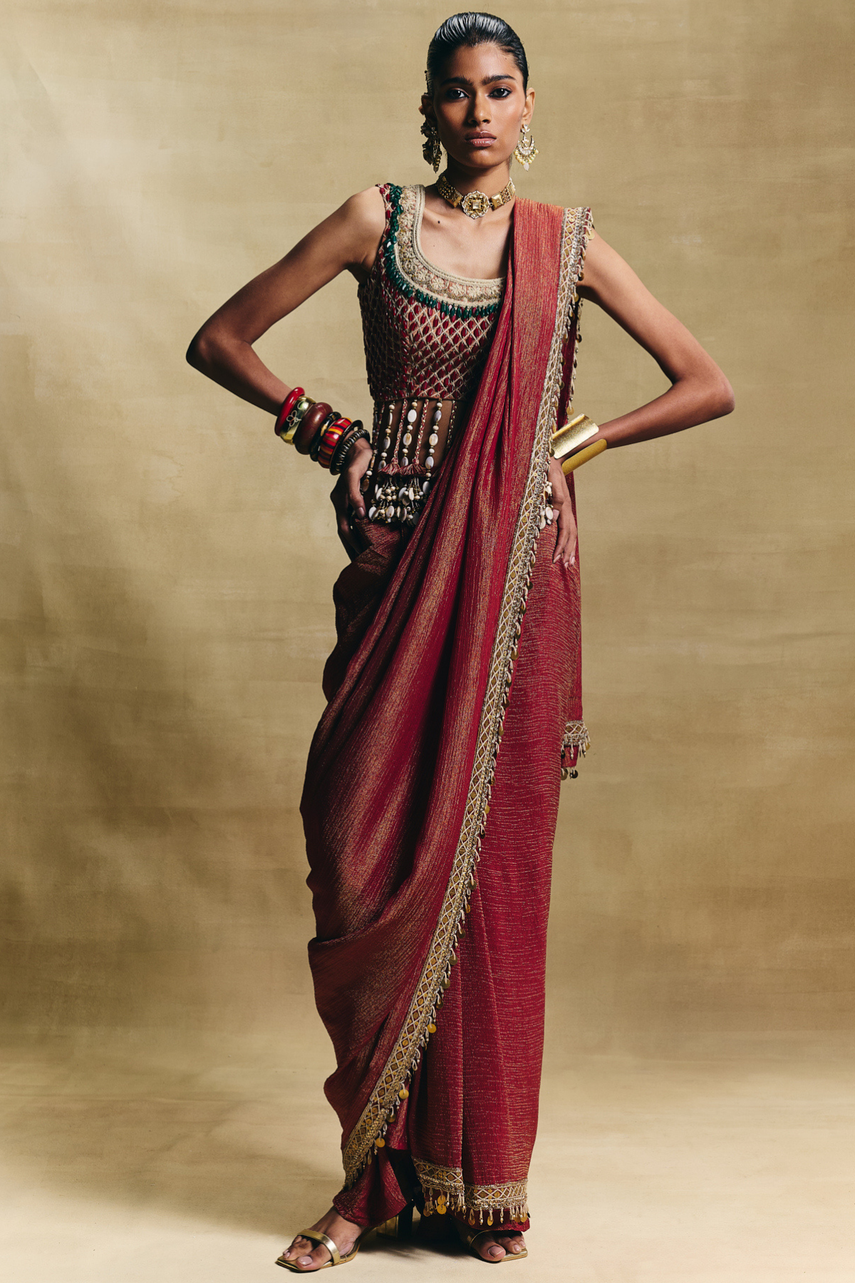 Red lovely blouse with stitched saree