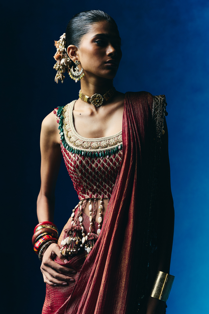 Red lovely blouse with stitched saree