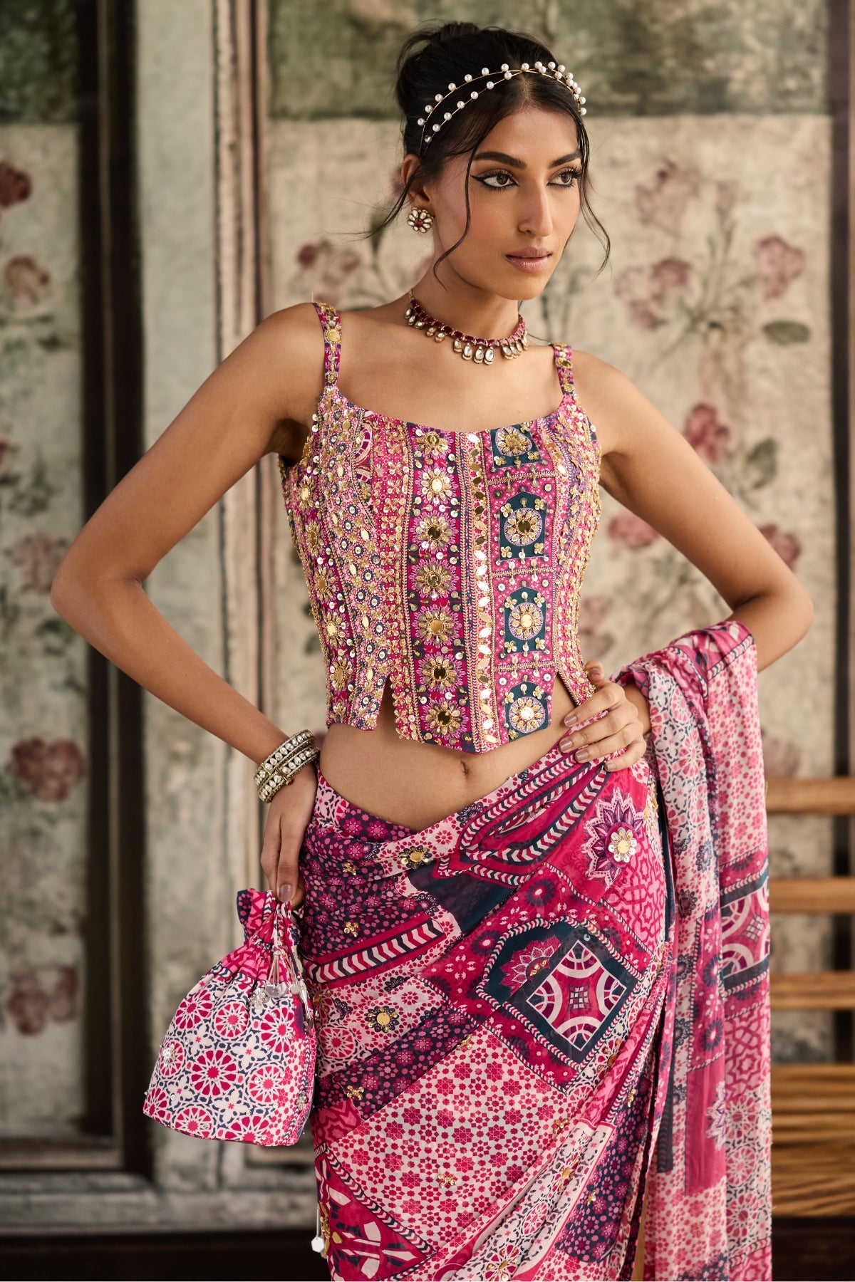 FUSCHIA PRINT AND HIGHLIGHTED CORSET BLOUSE PAIRED WITH PRE-DRAPED CLASSIC  SAREE  SET