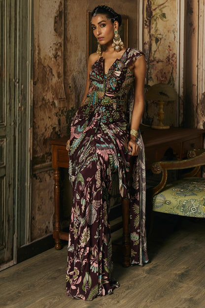 PLUM PRINTED AND HIGHLIGHTED CORSET WITH DHOTI SKIRT SAREE SET