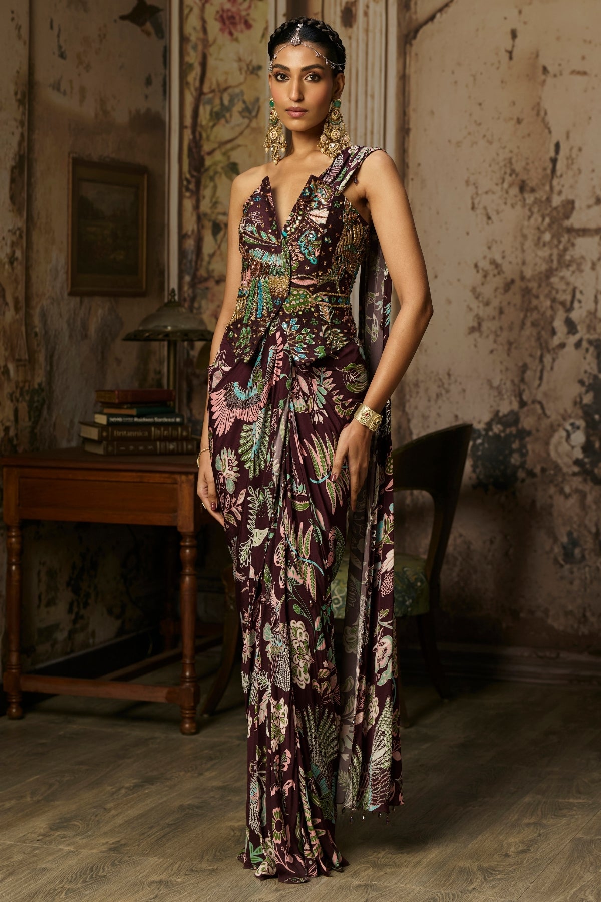 PLUM PRINTED AND HIGHLIGHTED CORSET WITH DHOTI SKIRT SAREE SET