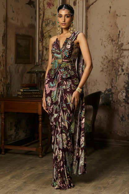 PLUM PRINTED AND HIGHLIGHTED CORSET WITH DHOTI SKIRT SAREE SET