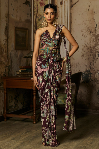 PLUM PRINTED AND HIGHLIGHTED CORSET WITH DHOTI SKIRT SAREE SET