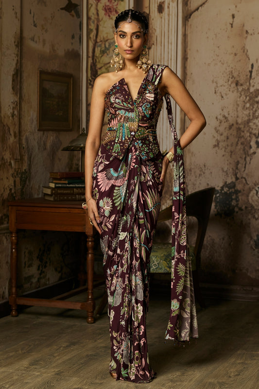 PLUM PRINTED AND HIGHLIGHTED CORSET WITH DHOTI SKIRT SAREE SET