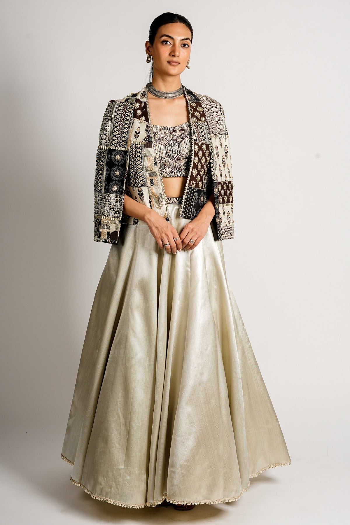 Sera Metallic Lehenga With Bustier and Patchwork Cape Jacket