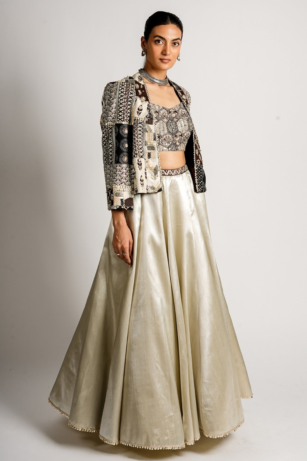 Sera Metallic Lehenga With Bustier and Patchwork Cape Jacket