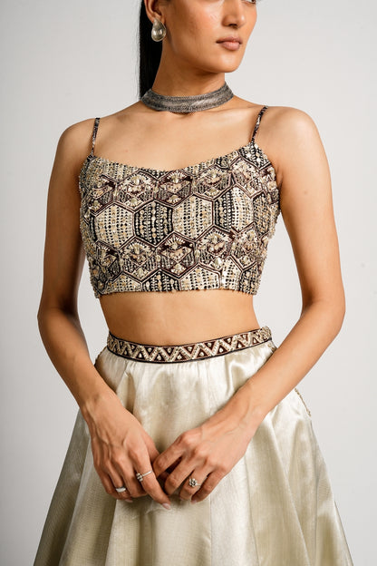Sera Metallic Lehenga With Bustier and Patchwork Cape Jacket