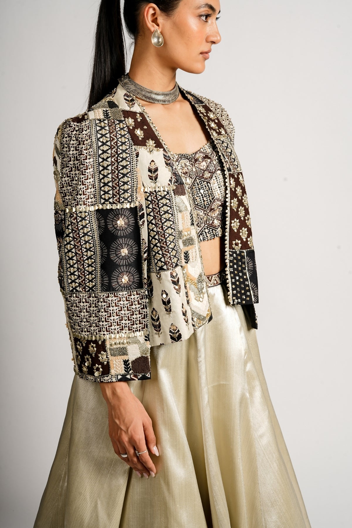 Sera Metallic Lehenga With Bustier and Patchwork Cape Jacket