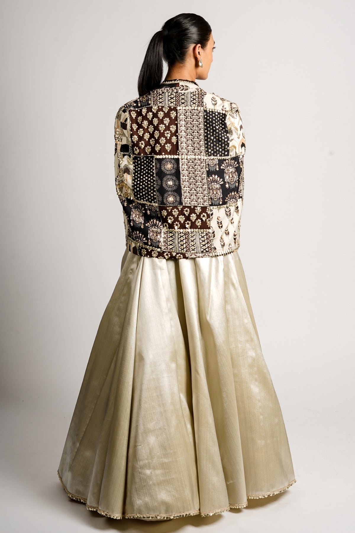 Sera Metallic Lehenga With Bustier and Patchwork Cape Jacket