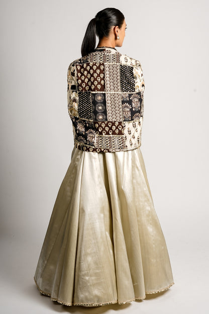 Sera Metallic Lehenga With Bustier and Patchwork Cape Jacket