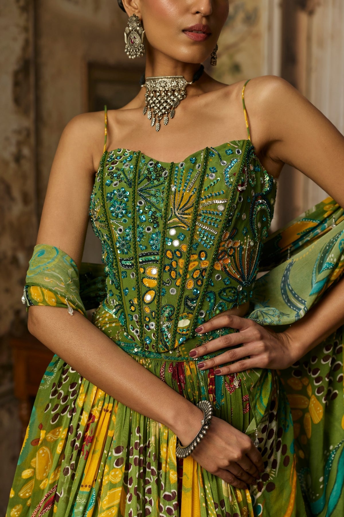 PEAR GREEN PRINTED AND HIGHLIGHTED CORSET LEHENGA SET