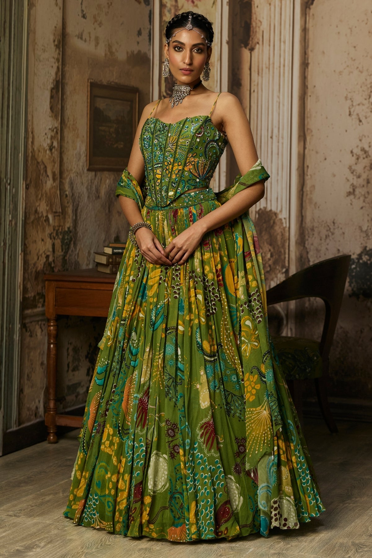 PEAR GREEN PRINTED AND HIGHLIGHTED CORSET LEHENGA SET