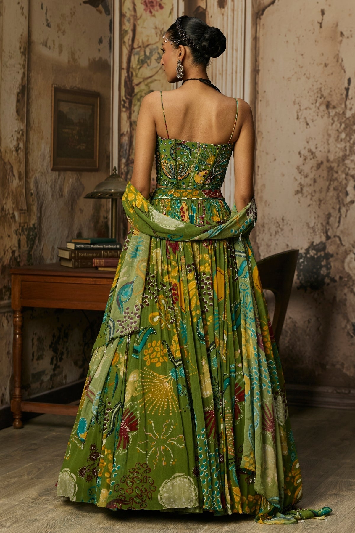 PEAR GREEN PRINTED AND HIGHLIGHTED CORSET LEHENGA SET