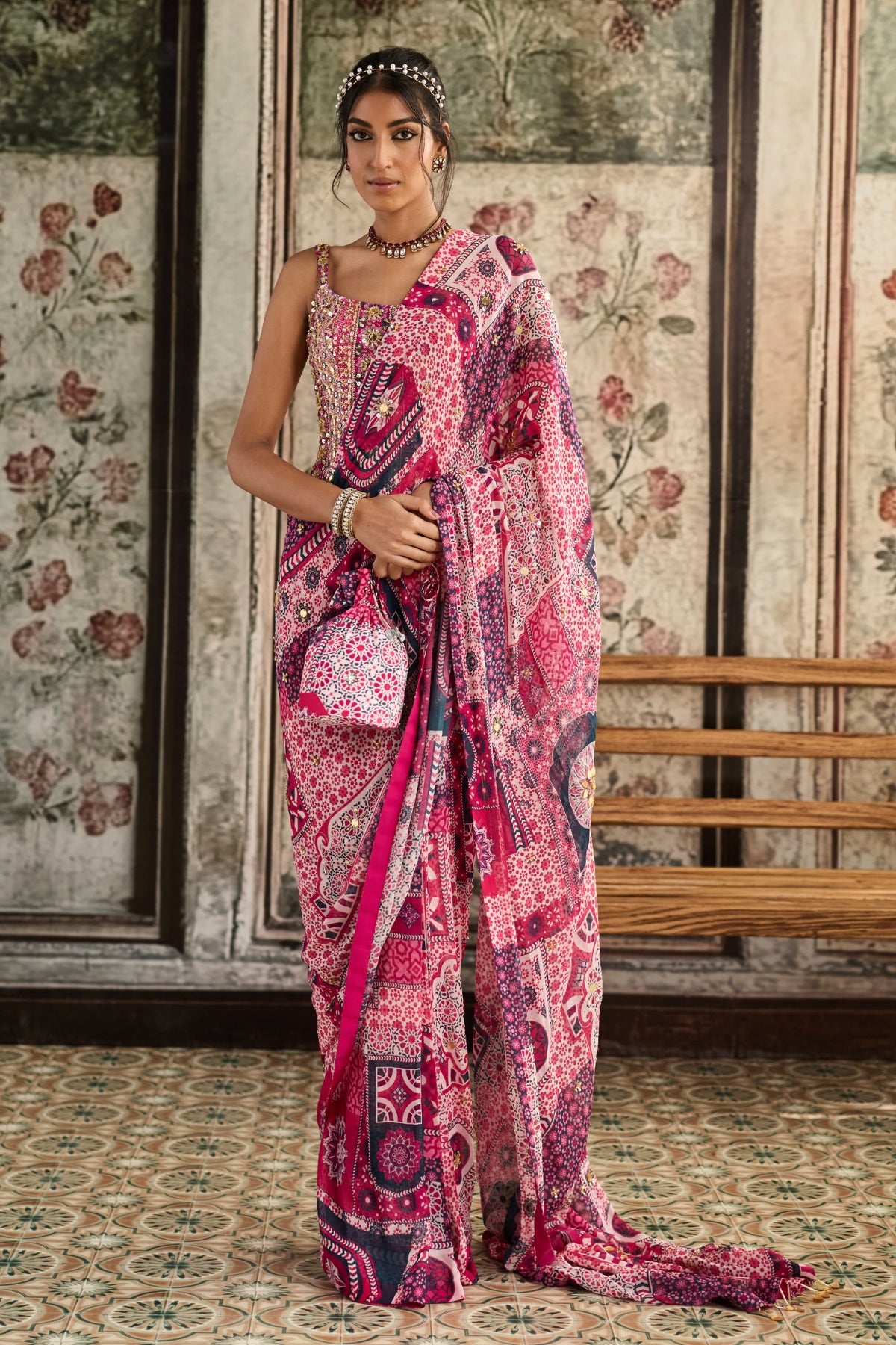 FUSCHIA PRINT AND HIGHLIGHTED CORSET BLOUSE PAIRED WITH PRE-DRAPED CLASSIC  SAREE  SET