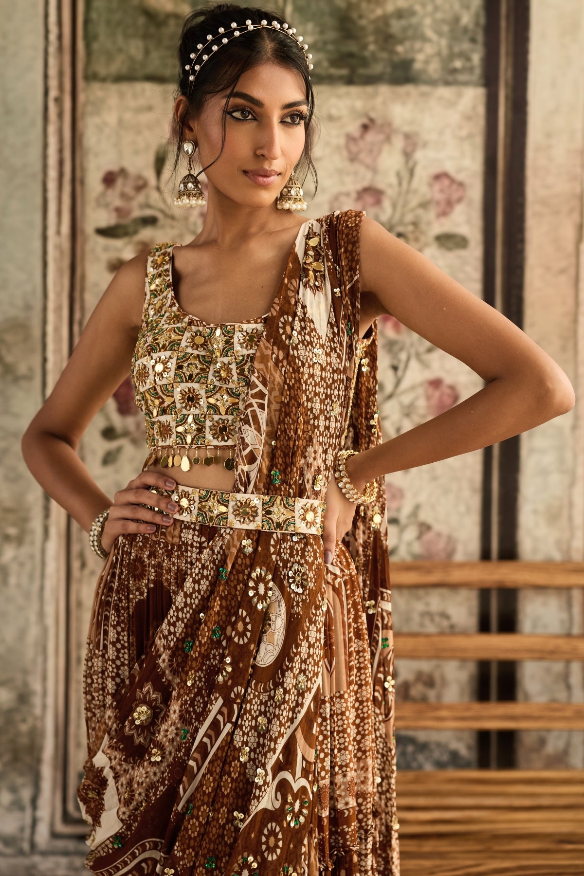 IVORY BUTTA PRINT AND HIGHLIGHTED SQUARE NECK BLOUSE WITH CARAMEL PRINT  AND HIGHLIGHTED TIERED SKIRT  SAREE SET