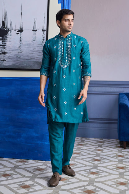 TEAL GREEN EMBROIDERED KURTA WITH PRINT HIGHLIGHTED BUNDI JACKET PAIRED WITH SOLID PANTS