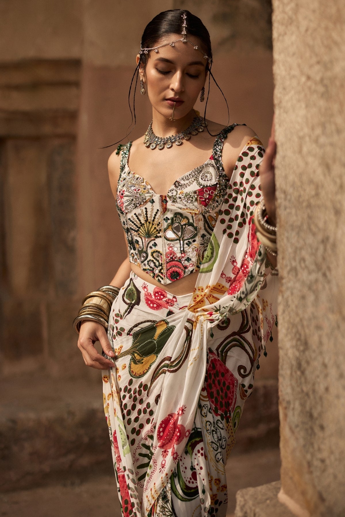 IVORY PRINT AND HIGHLIGHTED CORSET WITH  DHOTI SKIRT SAREE SET