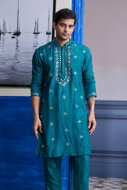 TEAL GREEN EMBROIDERED KURTA WITH PRINT HIGHLIGHTED BUNDI JACKET PAIRED WITH SOLID PANTS