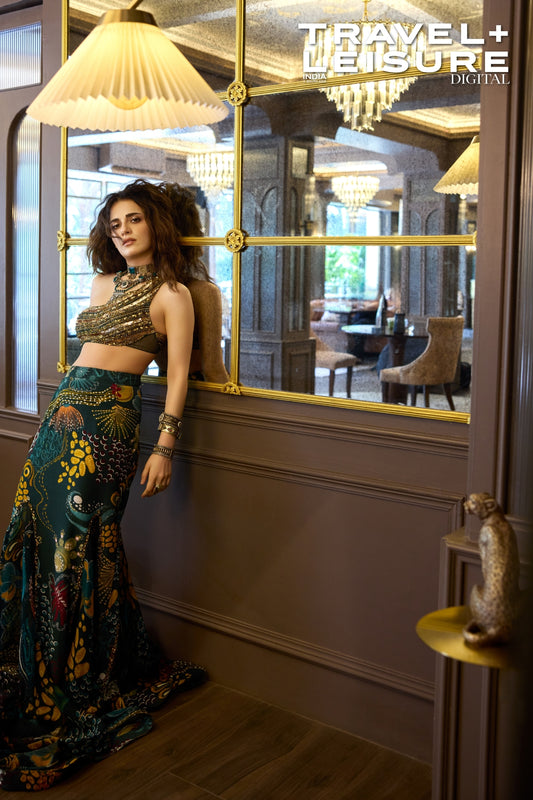 RADHIKA MADAN IN DARK GREEN EMBROIDERED BLOUSE AND FISHTAIL SKIRT SET