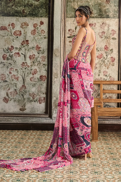 FUSCHIA PRINT AND HIGHLIGHTED CORSET BLOUSE PAIRED WITH PRE-DRAPED CLASSIC  SAREE  SET
