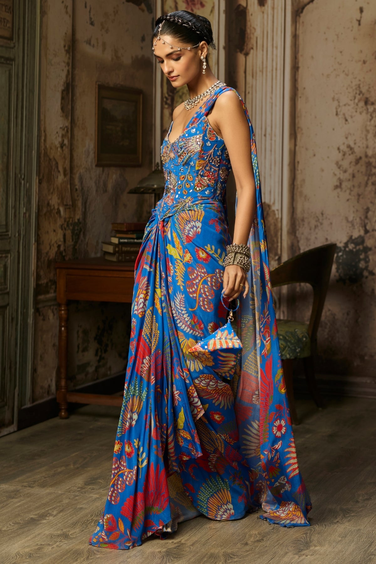 ELECTRIC BLUE PRINTED AND HIGHLIGHTED CORSET DHOTI SKIRT SAREE SET