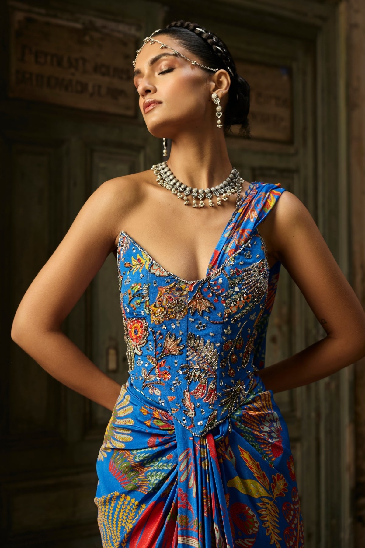 ELECTRIC BLUE PRINTED AND HIGHLIGHTED CORSET DHOTI SKIRT SAREE SET