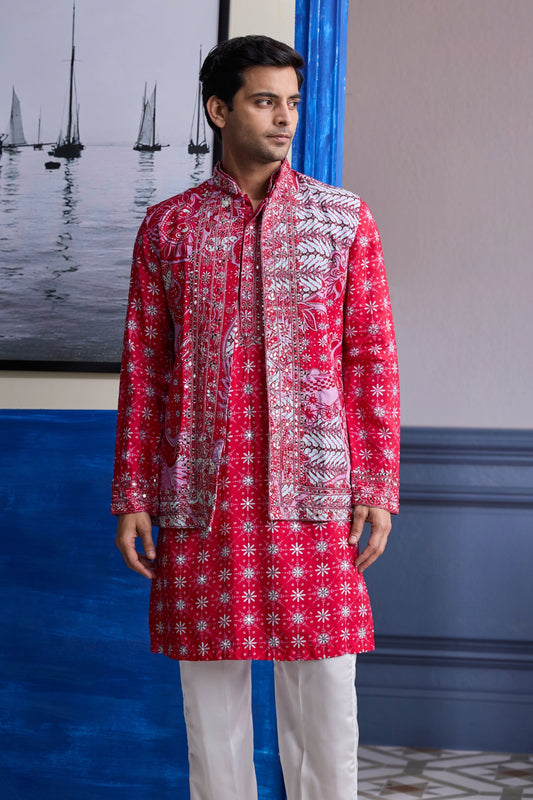 RED PRINT HIGHLIGHTED  KURTA WITH PRINT EMBROIDERED BUNDI AND IVORY PANTS