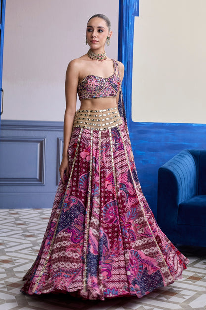 FUCHSIA FLORAL ONE-SHOULDER DRAPE BLOUSE WITH MIRROR LEHENGA SET