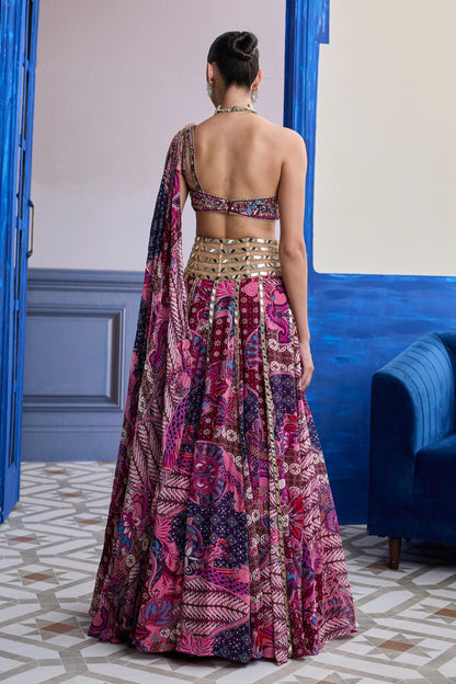 FUCHSIA FLORAL ONE-SHOULDER DRAPE BLOUSE WITH MIRROR LEHENGA SET