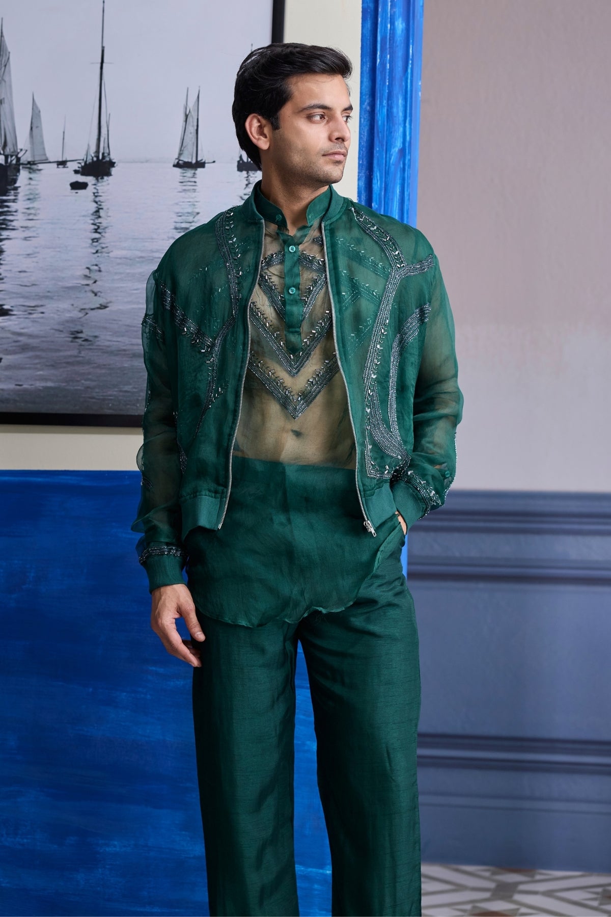 DARK GREEN ORGANZA KURTA WITH EMBROIDERED ORGANZA BOMBER JACKET PAIRED WITH SOLID PANTS