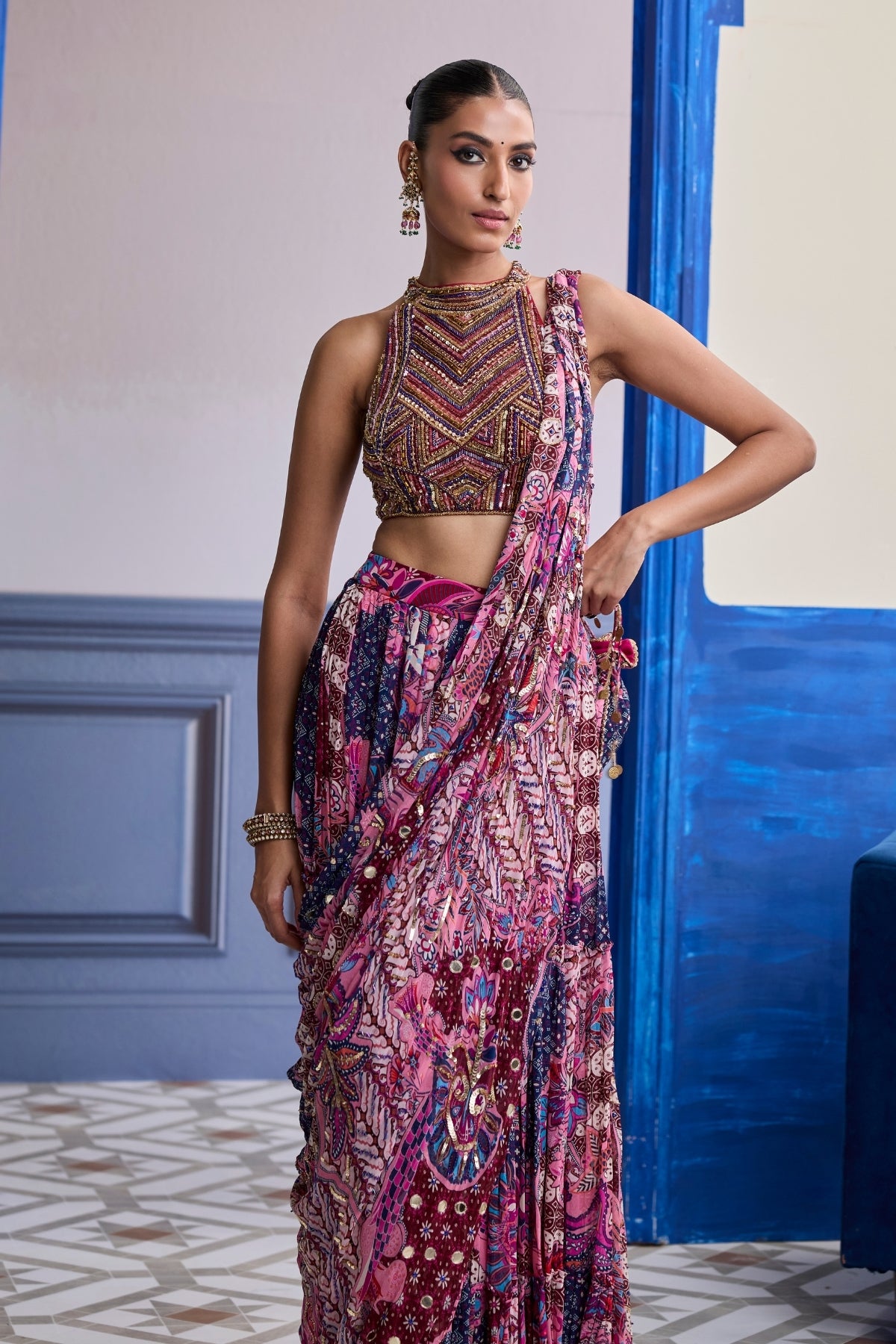 FUCHSIA EMBROIDERED BLOUSE WITH FLORAL DRAPE TIERED SAREE SET