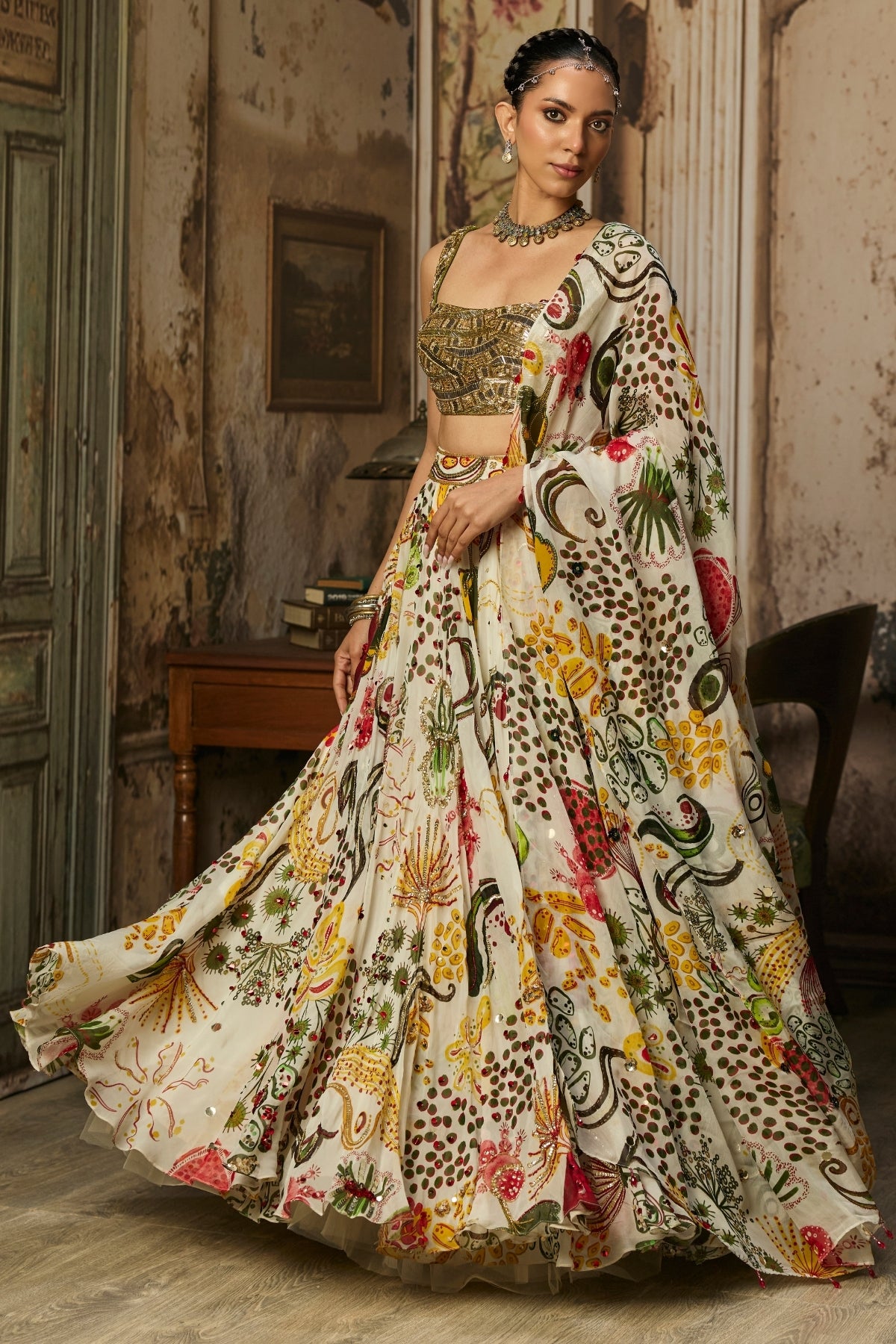 LIGHT GOLD EMBELLISHED BLOUSE AND HIGHLIGHTED LEHENGA SET