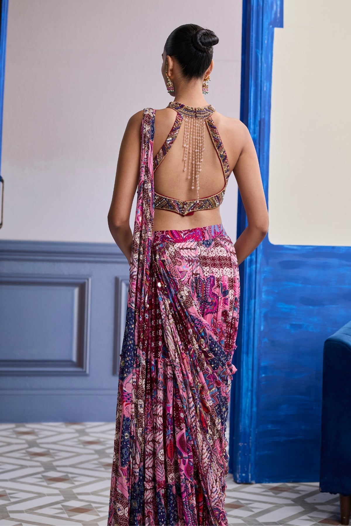 FUCHSIA EMBROIDERED BLOUSE WITH FLORAL DRAPE TIERED SAREE SET