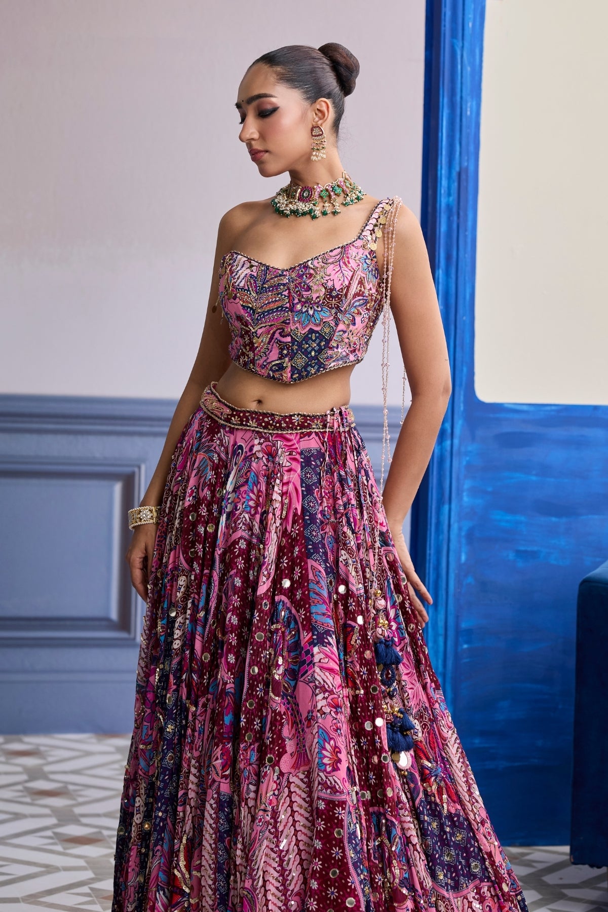 FUCHSIA FLORAL CORSET WITH HIGHLIGHTED LEHENGA SET