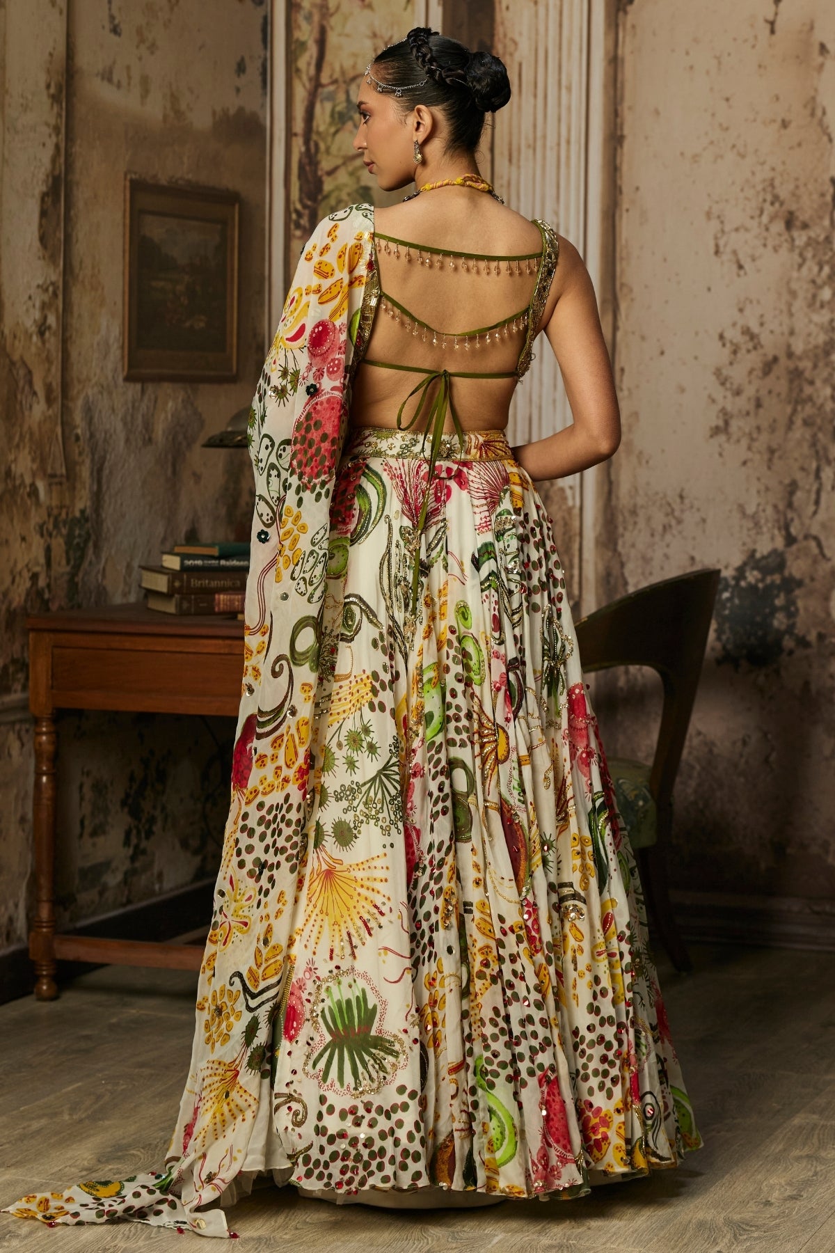 LIGHT GOLD EMBELLISHED BLOUSE AND HIGHLIGHTED LEHENGA SET