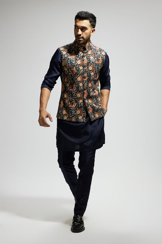 Blue Jaal Embellished Bundi Paired with Solid Blue Kurta and Pants